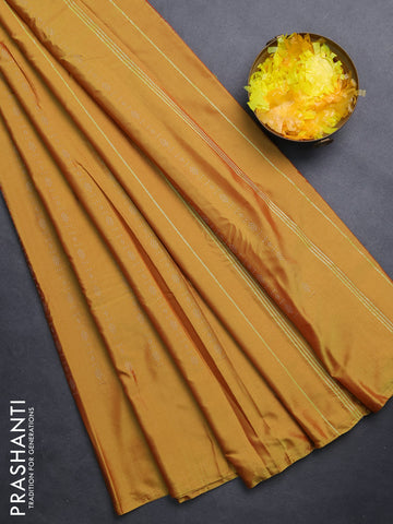 Arani semi silk saree mustard yellow with allover silver zari weaves in borderless style