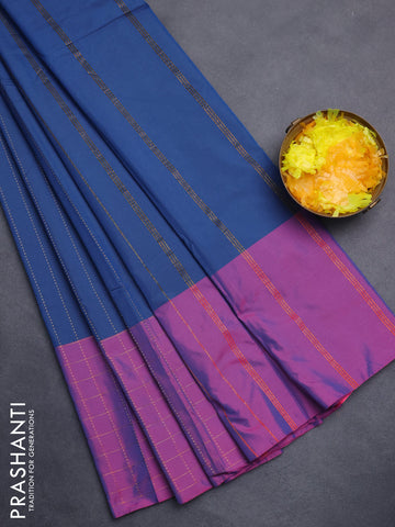 Arani semi silk saree blue and purple with allover copper zari weaves and zari checked border