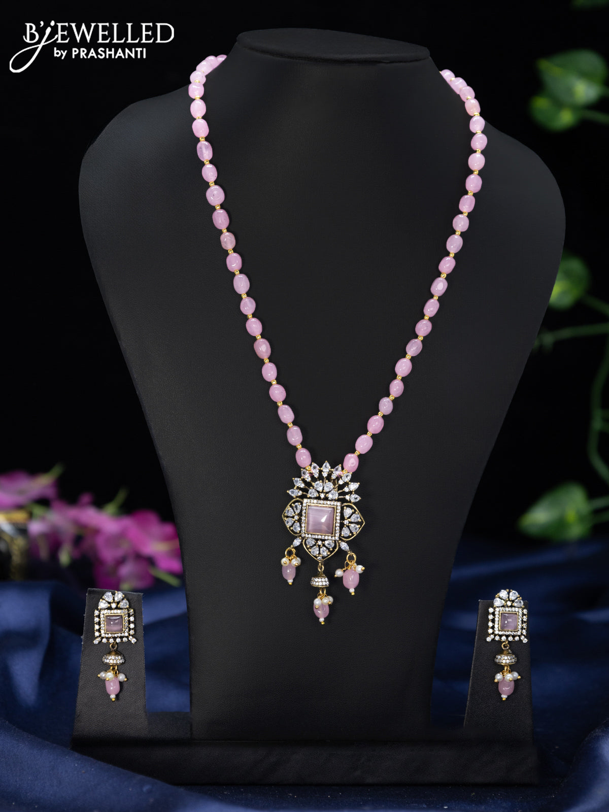Beaded baby pink necklace with emerald & cz stones and pearl hangings in victorian finish