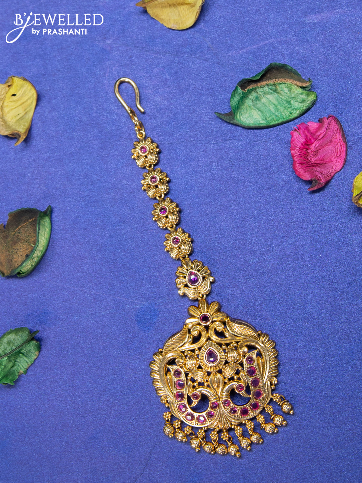 Antique maang tikka peacock design with pink kemp stones and golden beads hangings