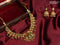 Antique necklace lakshmi design with emerald & cz stones and golden beads hangings