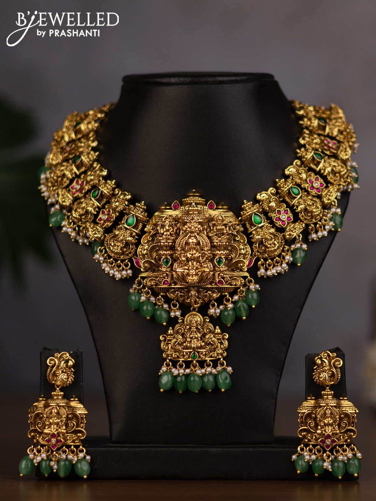 Antique necklace lakshmi design with jadau stones and green beads hanging