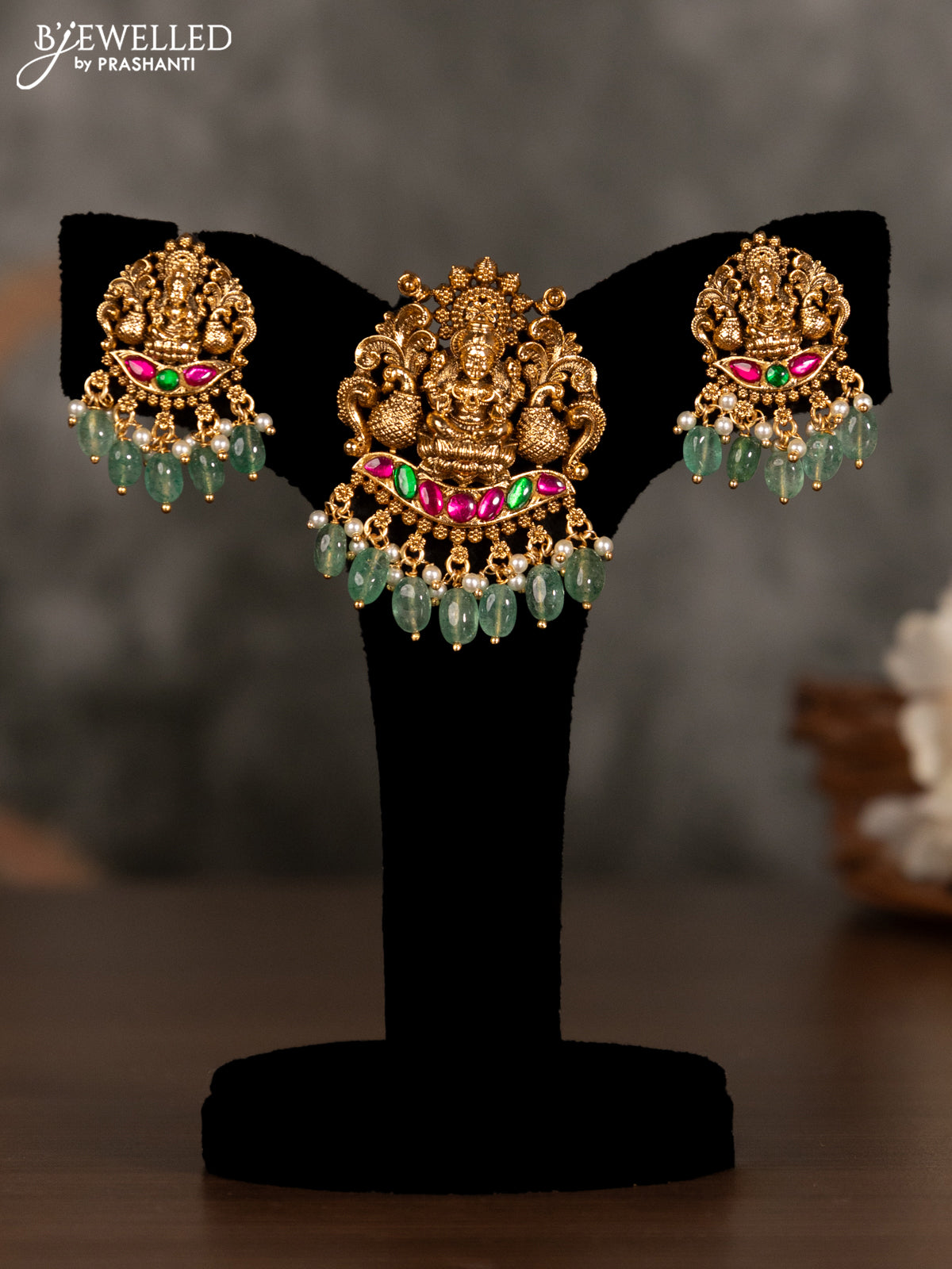 Antique pendant set lakshmi design with kemp stones and green beads hanging