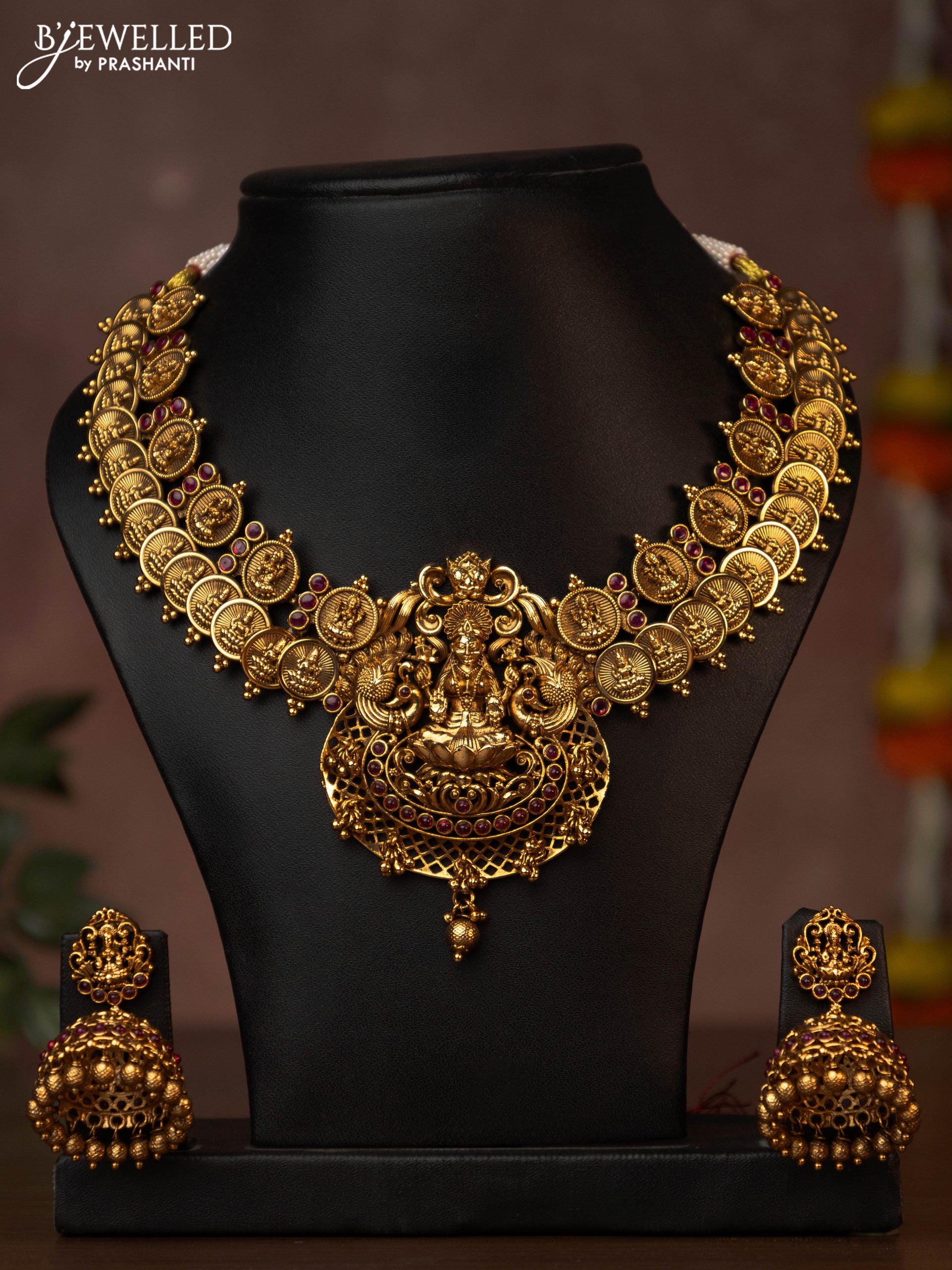Antique necklace lakshmi kasu design with pink kemp stones and golden beads hanging