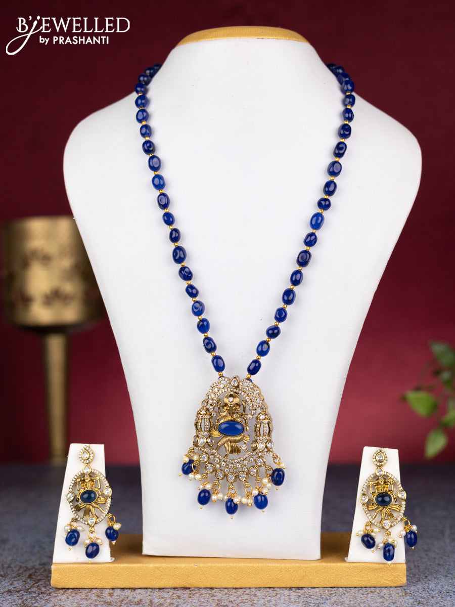 Beaded blue necklace ganesha pendant with sapphire & cz stones and pearl & beads hangings in victorian finish