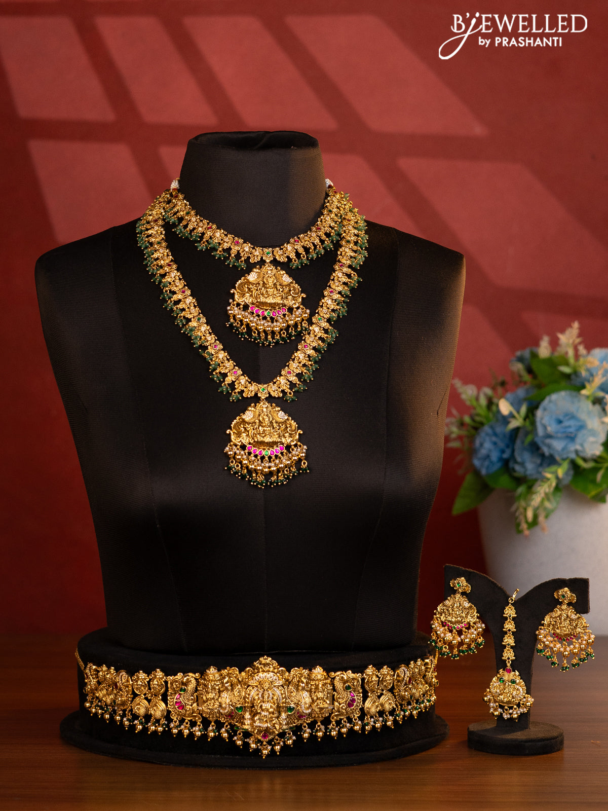 Antique bridal set lakshmi design with jadau cz stones and green beads hanging