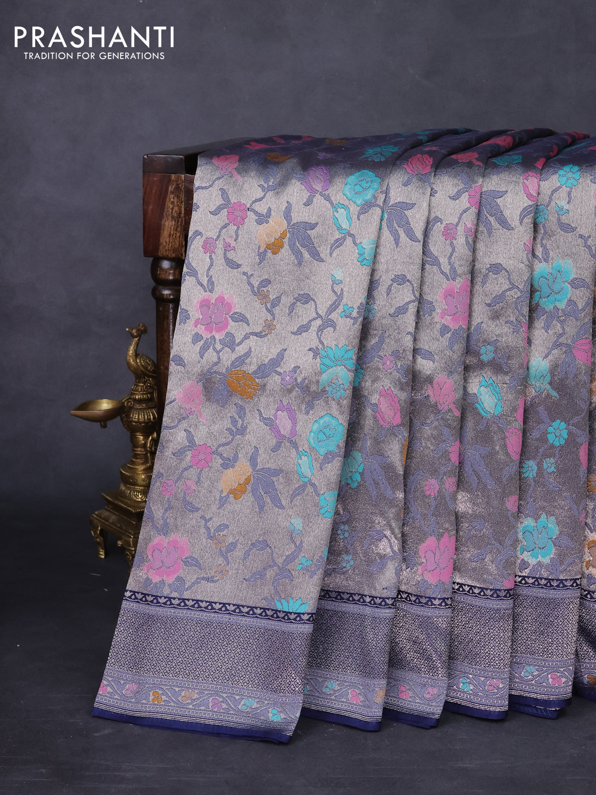 Banarasi tissue silk saree navy blue with allover thread woven floral weaves and silver zari woven border