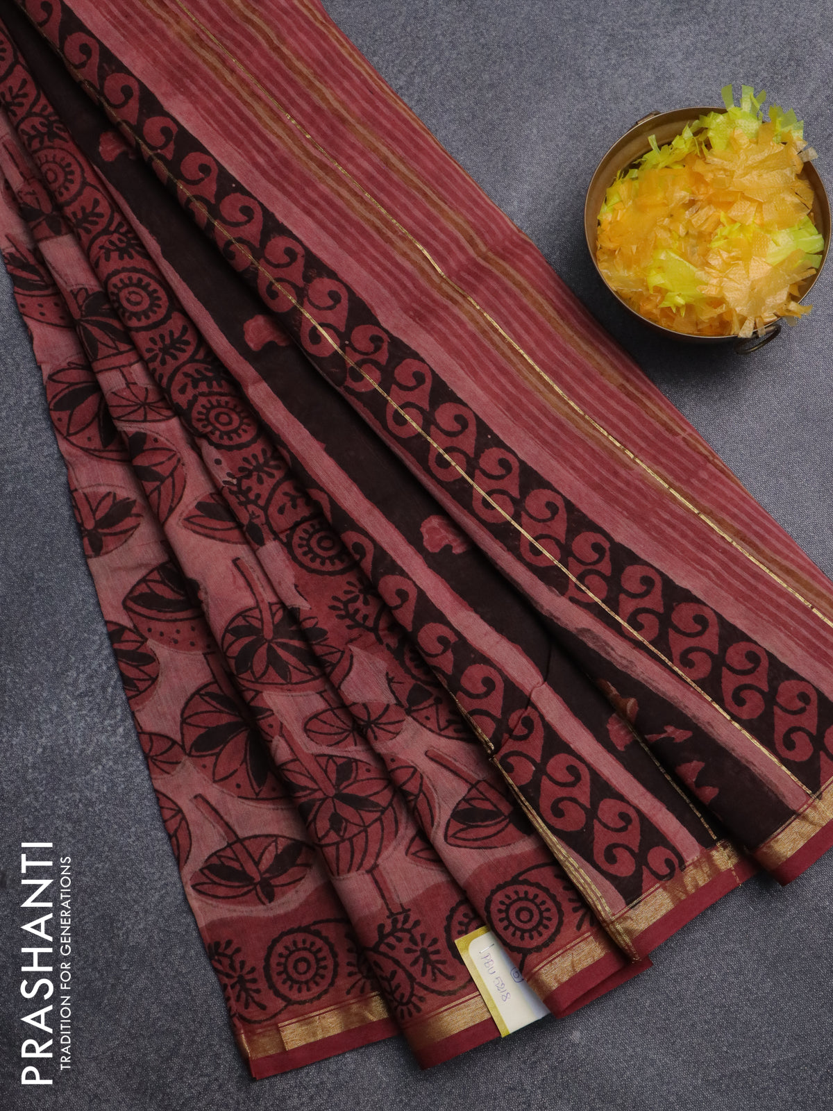 Chanderi bagru saree pastel maroon with allover prints and small zari woven border