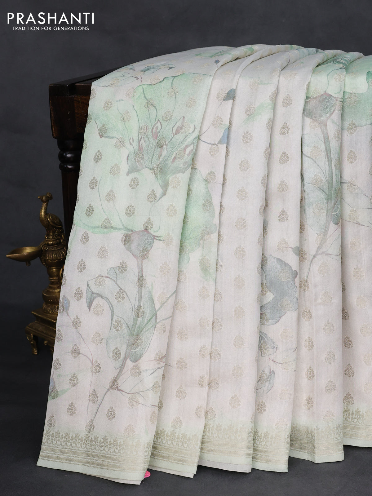 Chiniya silk saree off white and pastel green with allover silver zari buttas & digital prints and zari woven border
