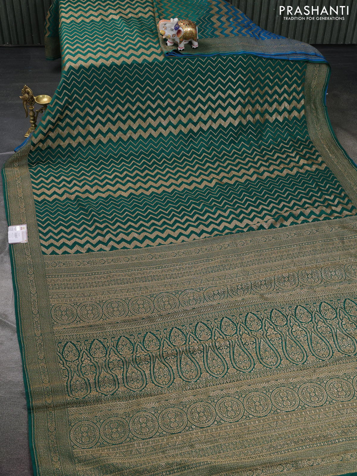 Banarasi crepe saree green and cs blue with allover geometric zari weaves and woven border
