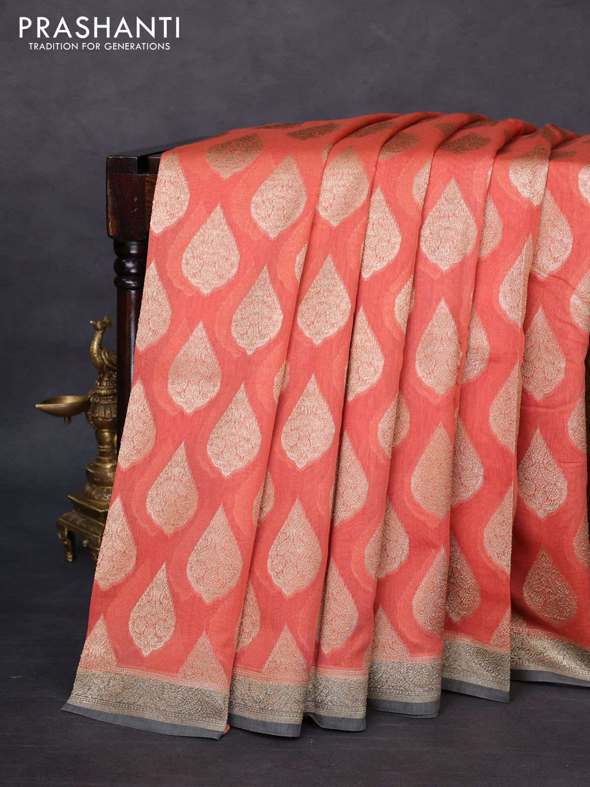 Banarasi silk cotton saree peach orange and grey with woven buttas and woven border