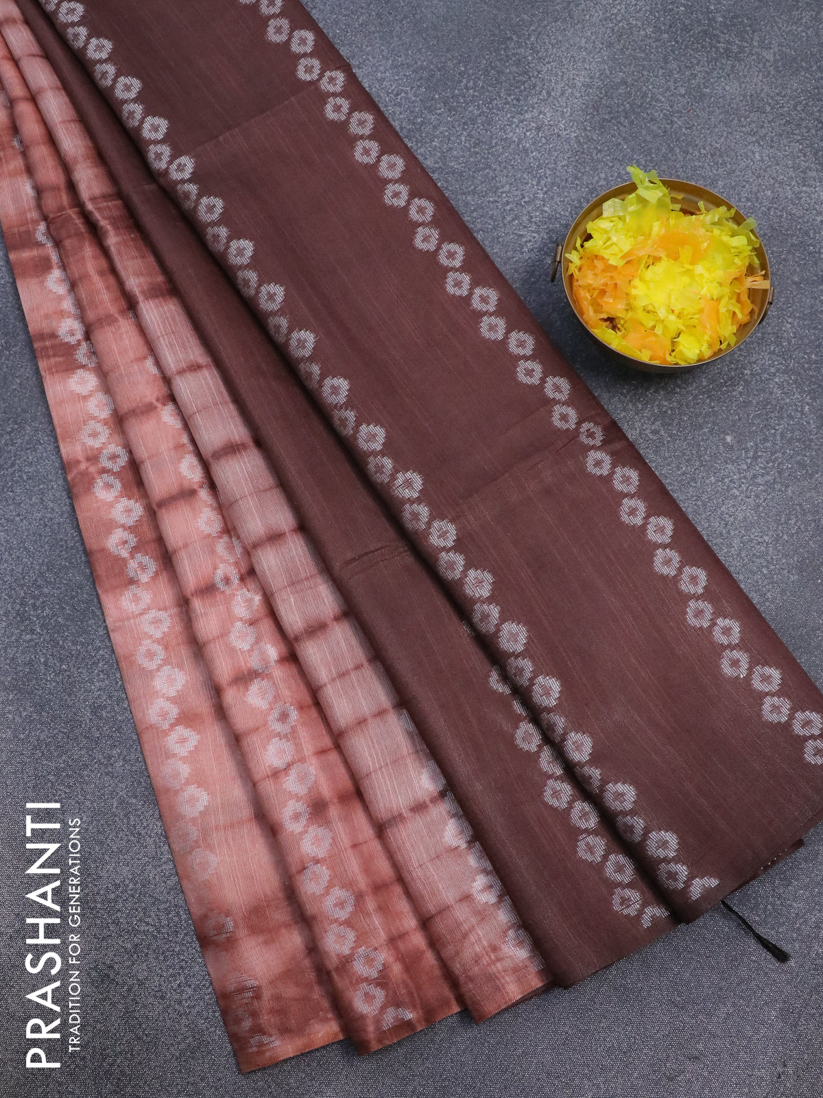 Bamboo silk saree peach shade and brown with allover tie & dye prints & geometric thread weaves in borderless style