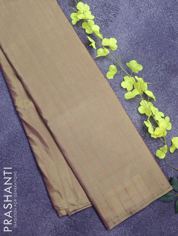 Arani semi silk saree dual shade of green and dual shade of yellowish pink with allover copper zari weaves in borderless style