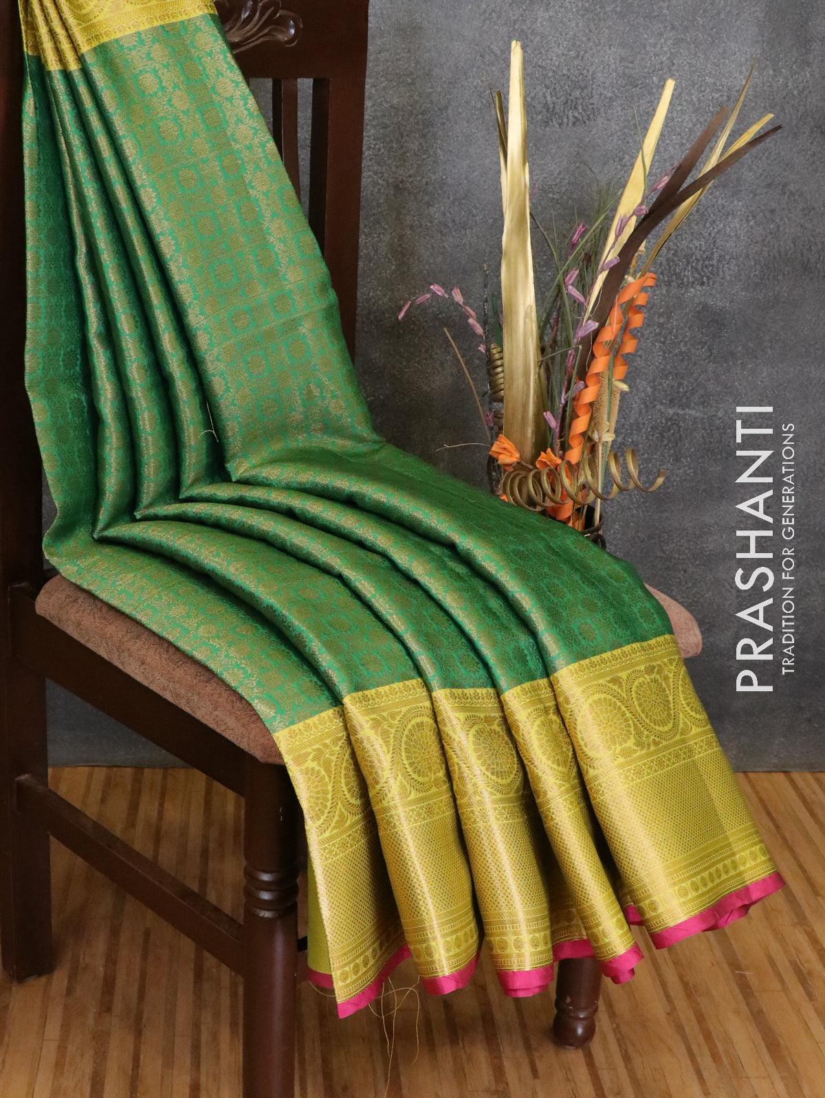 Banarasi kora saree green and yellow with allover zari weaves and floral zari woven border