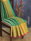 Banarasi kora saree green and yellow with allover zari weaves and long zari woven border