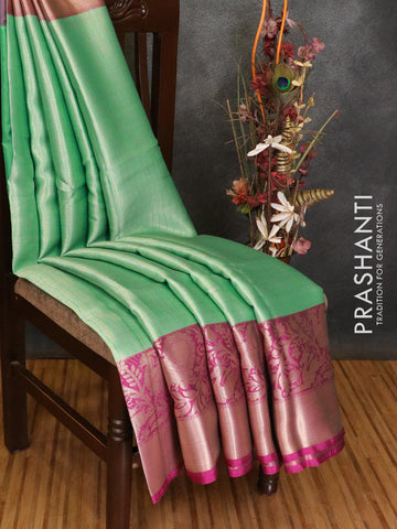 Banarasi kora saree teal green and purple with allover leaf zari weaves and long zari woven border