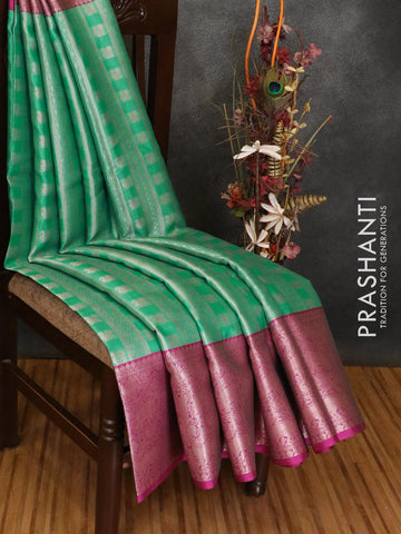 Banarasi kora saree teal green and purple with allover zari weaves and zari woven border