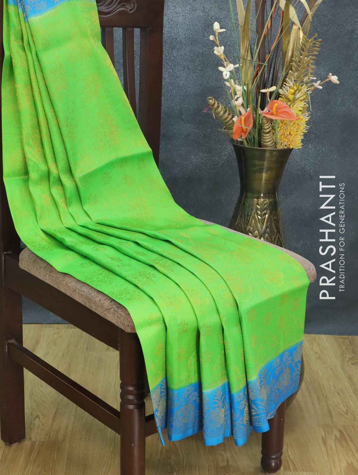 Banarasi semi silk saree green and cs blue with allover zari weaves and zari woven border