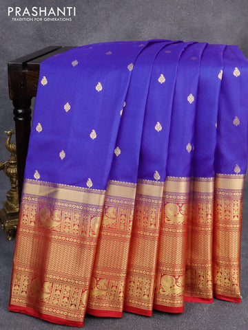 Pure gadwal silk saree blue and red with allover zari woven buttas and long zari woven border