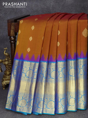 Pure gadwal silk saree dark mustard and dual shade of bluish green with allover zari woven buttas and temple design long floral zari woven border