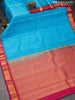 Pure kanjivaram silk saree blue and pink with paisley zari woven buttas and temple design zari woven korvai