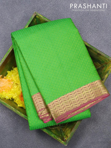 Pure kanjivaram silk saree light green and pink with allover self emboss and zari woven border