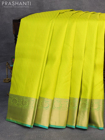 Pure kanjivaram silk saree lime yellow and dual shade of bluish green with allover self emboss & zari weaves and floral zari woven border