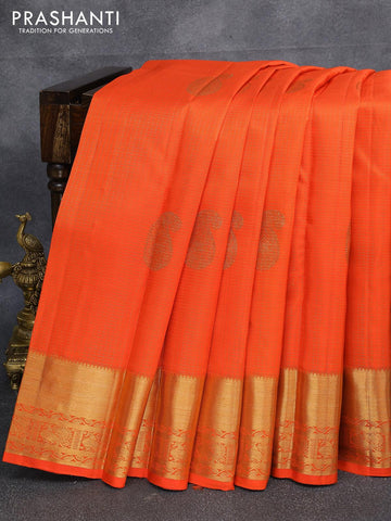 Pure kanjivaram silk saree orange with allover small zari checks & paisley buttas and zari woven border