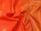 Pure kanjivaram silk saree orange with allover small zari checks & paisley buttas and zari woven border