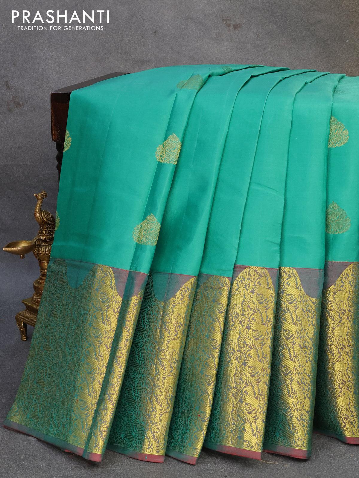 Pure kanjivaram silk saree teal blue and dual shade of maroon with zari woven buttas and rich zari woven border