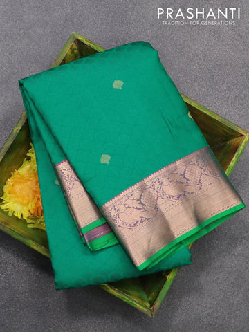 Pure kanjivaram silk saree teal green and green with allover self emboss and zari woven border
