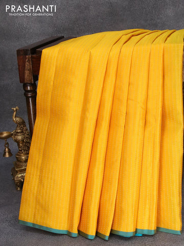 Pure kanjivaram silk saree yellow and light blue with allover zari weaves and piping border
