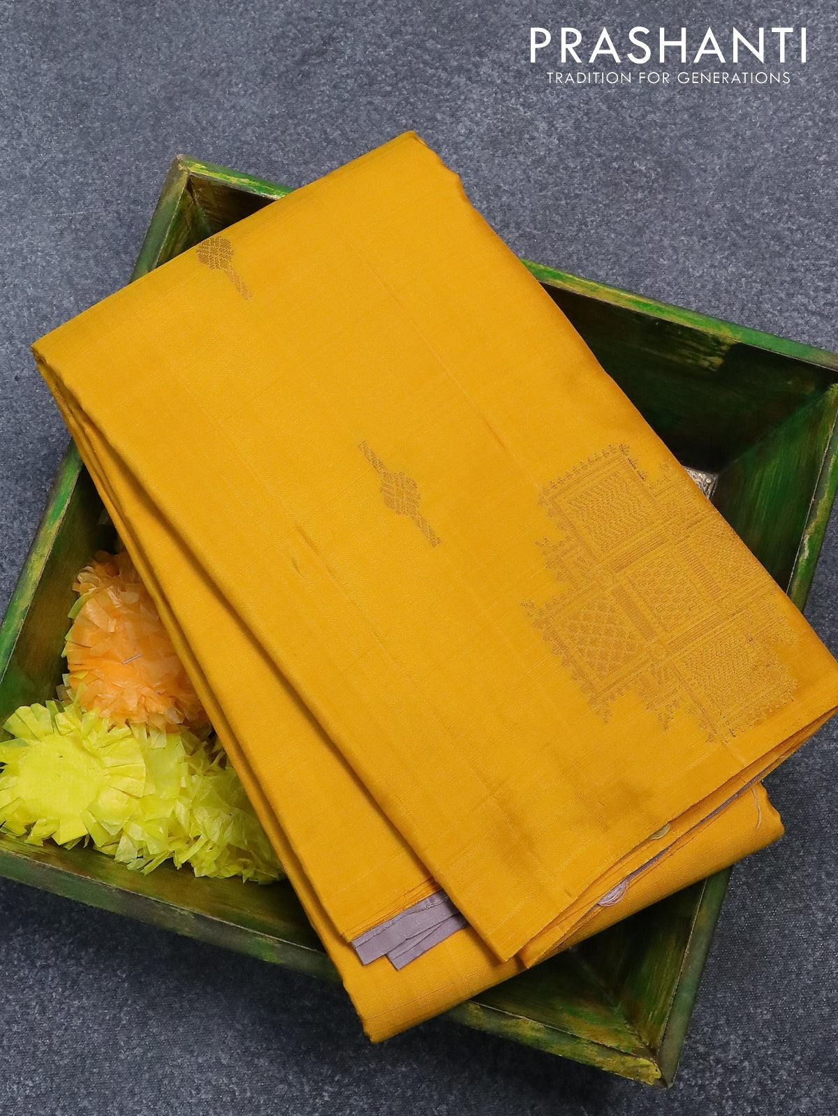 Pure kanjivaram silk saree yellow and pastel grey with zari woven box type buttas in borderless style