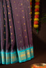 Mandir Purple & Sea Blue Gadwal Checks And Buttis Saree