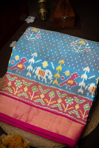 Mandir Aqua Blue & Pink Ikat Ikat Saree